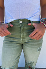 Olive colored wide leg, stretchy Dad jeans